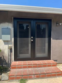 Modern Black Centurion Screen Door on NorCal Home Entry