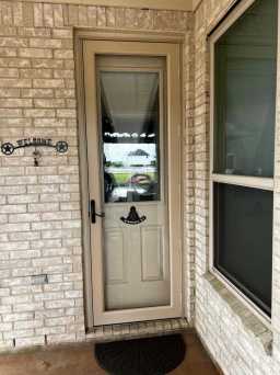 Northern California Sand Piper Beige Storm Doors Installed