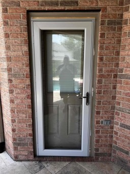 Gray Custom Storm Door Installed on Northern California