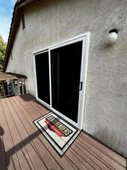 Front view of White Sliding providing security in Northern California