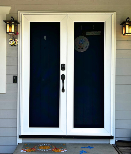 White double Centurion security screen doors with full view stainless steel mesh